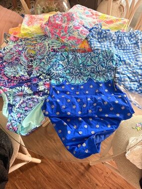 3 Lilly Pulitzer swimsuits, 2 beach towels, baseball cap